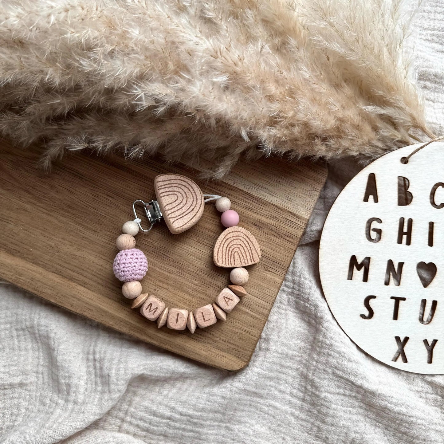 Personalisierte Schnullerkette mit Name - Regenbogen Hauniper
